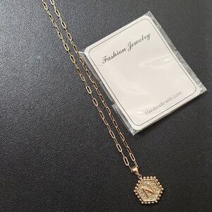 Fashion Jewelry - Gold tone "N" Necklace 8.5in. Chain.